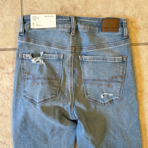 NWT American Eagle super high rise flare distressed jeans. Size 4. - Picture 5 of 5